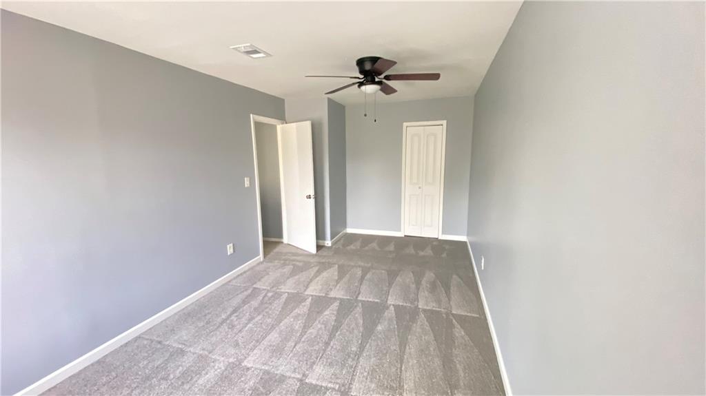 3791 Reston Lane Decatur, GA 30034 - Photo 18 of 20 a view of room with a ceiling fan