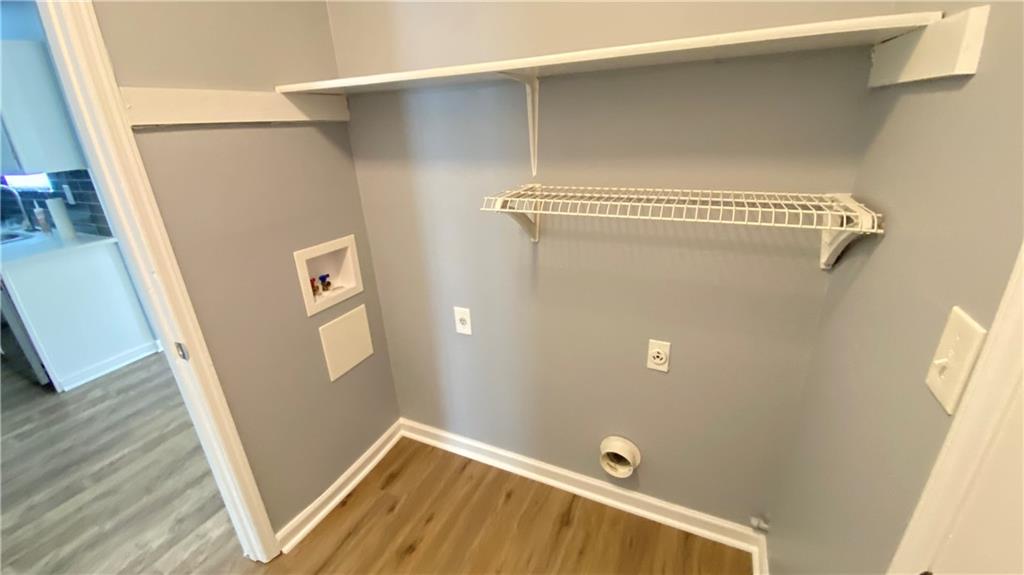 3791 Reston Lane Decatur, GA 30034 - Photo 10 of 20 a view of a hallway with wooden floor
