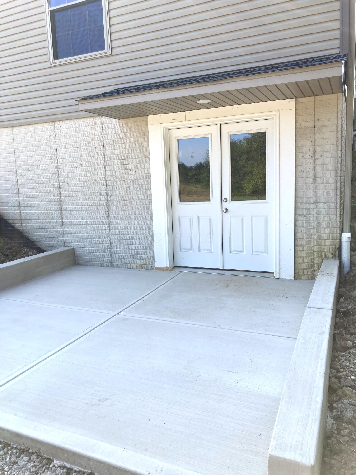 15571 Fairgrounds Road Centerburg, OH 43011 - Photo 6 of 6 Closeup of walkout patio.