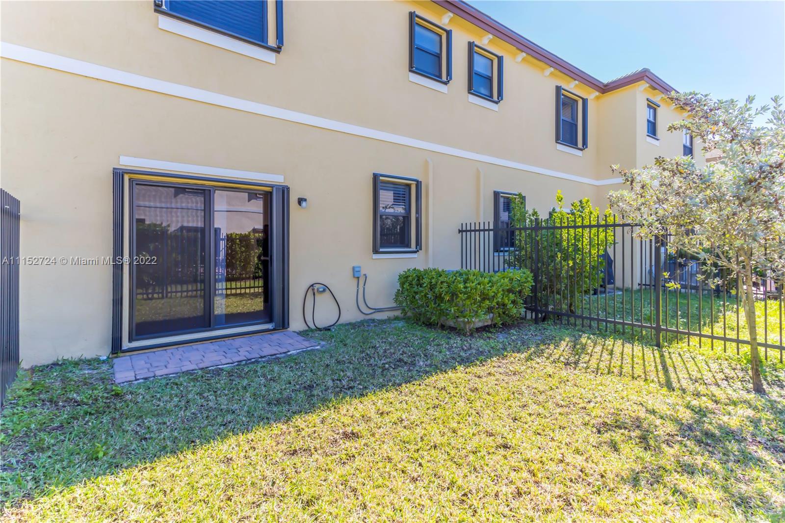 Davie Davie, FL 33314 - Photo 21 of 34 a view of front door and small yard