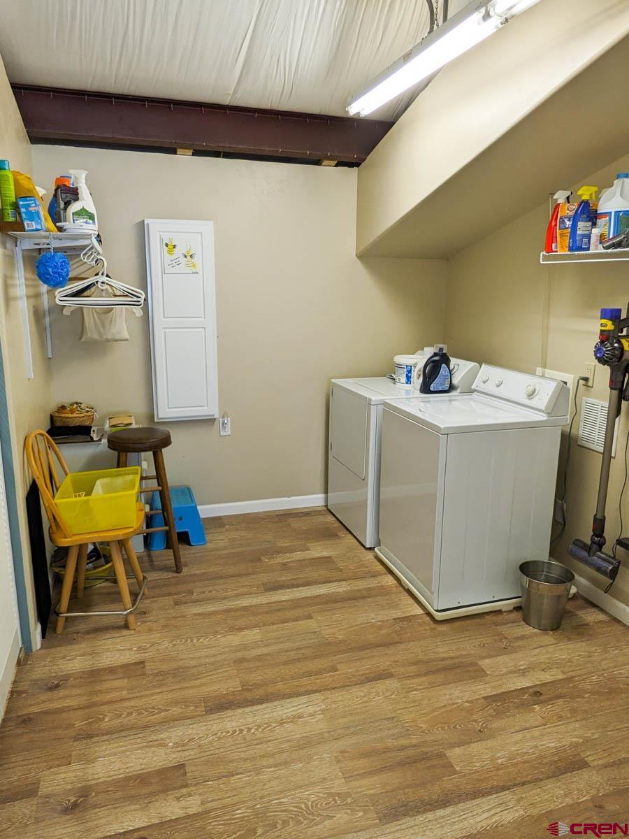 1244 Ash Mesa Road Delta, CO 81416 - Photo 17 of 35 a view of workspace with wooden floor