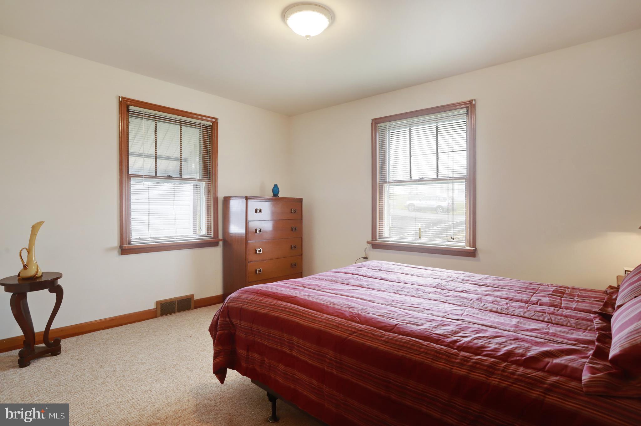 810 Park Road Hagerstown, MD 21740 - Photo 19 of 32 Bedroom 1 with hardwood floor under carpet.