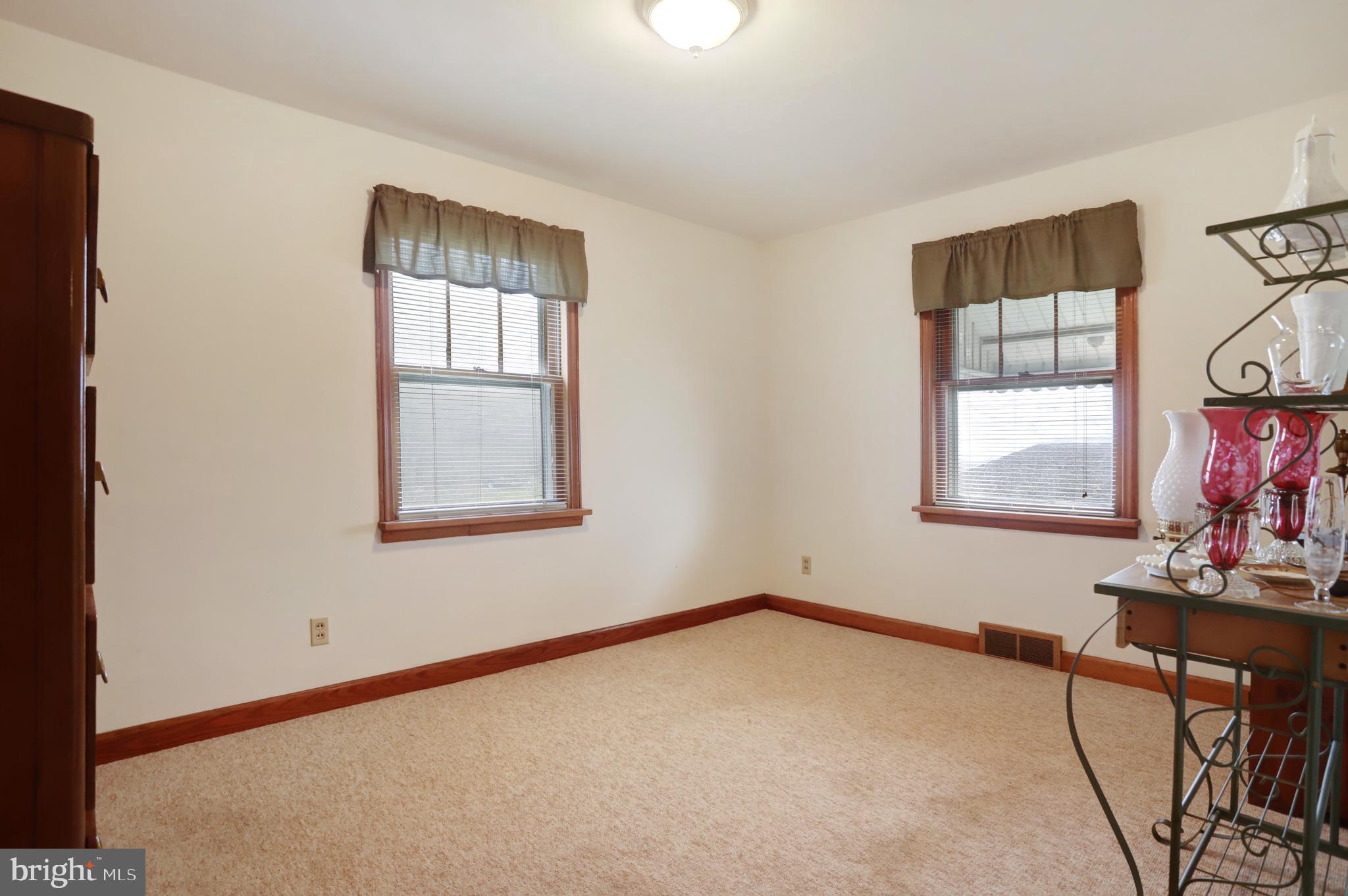 810 Park Road Hagerstown, MD 21740 - Photo 23 of 32 Bedroom 2 with hardwood floor under carpet.