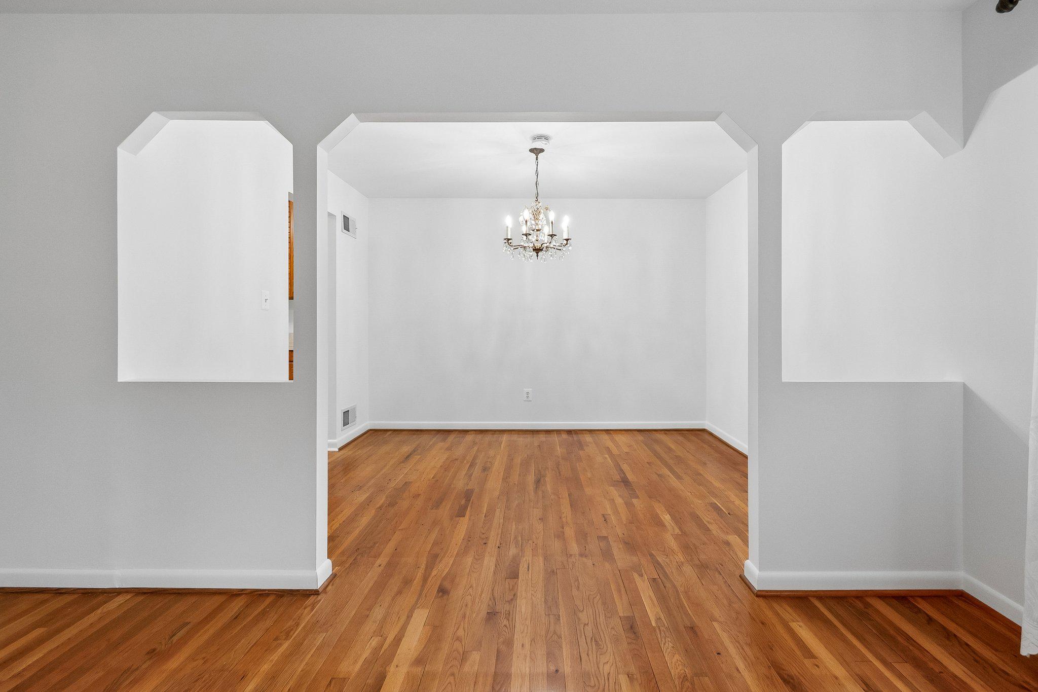 2807 Hathaway Terrace Silver Spring, MD 20906 - Photo 4 of 20 a view of a room with wooden floor and white walls