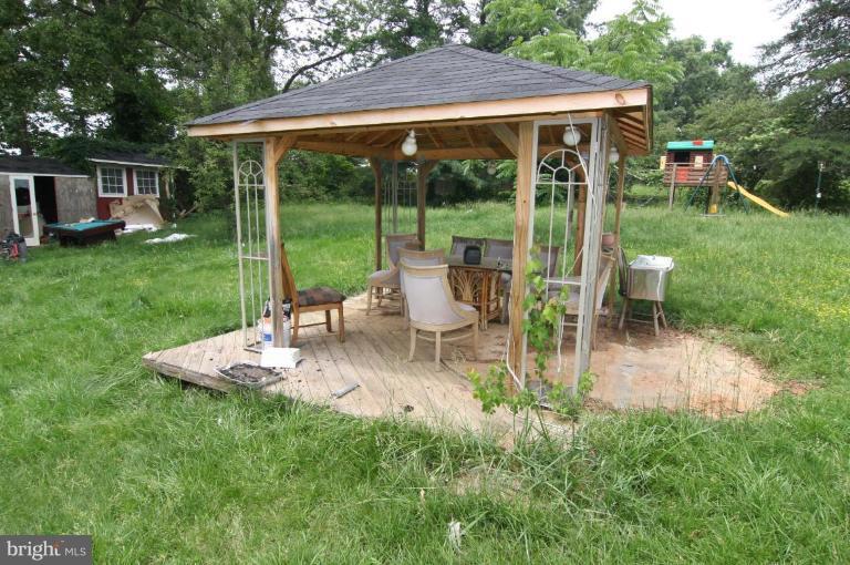 7819 Signal Hill Road Manassas, VA 20111 - Photo 20 of 22 Covered back yard patio/gazebo