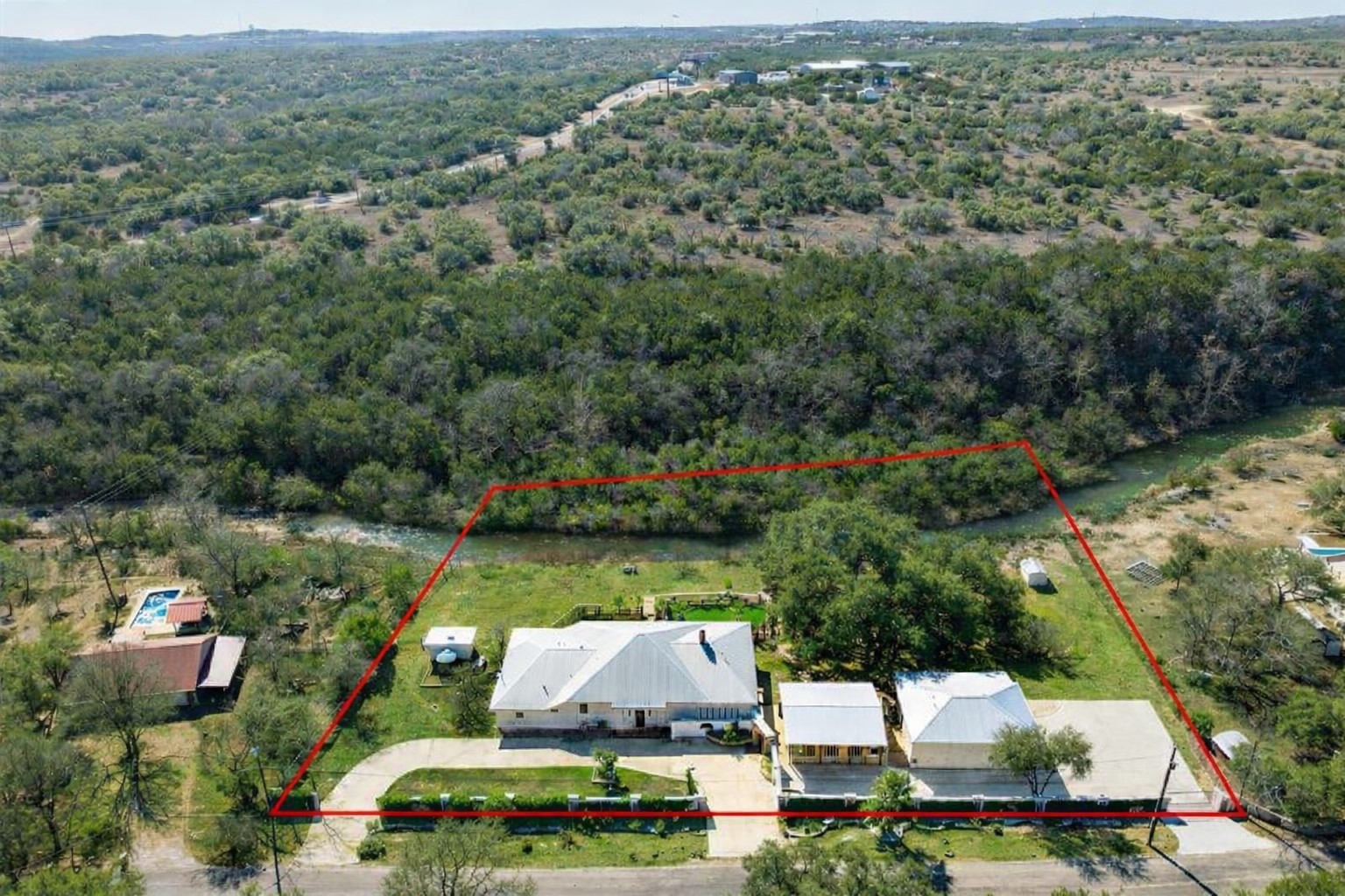 340 Barton Ranch Road Dripping Springs, TX 78620 - Photo 1 of 39 Enhanced using AI