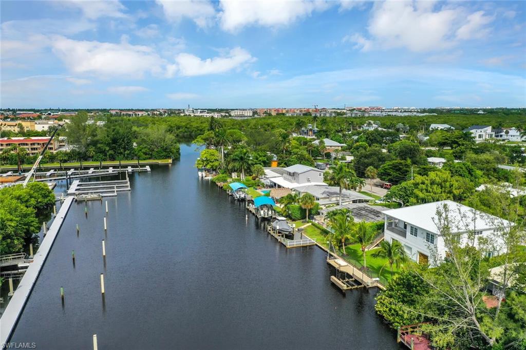 2048 Harbor Lane Naples, FL 34104 - Photo 33 of 35 a view of a lake with a city