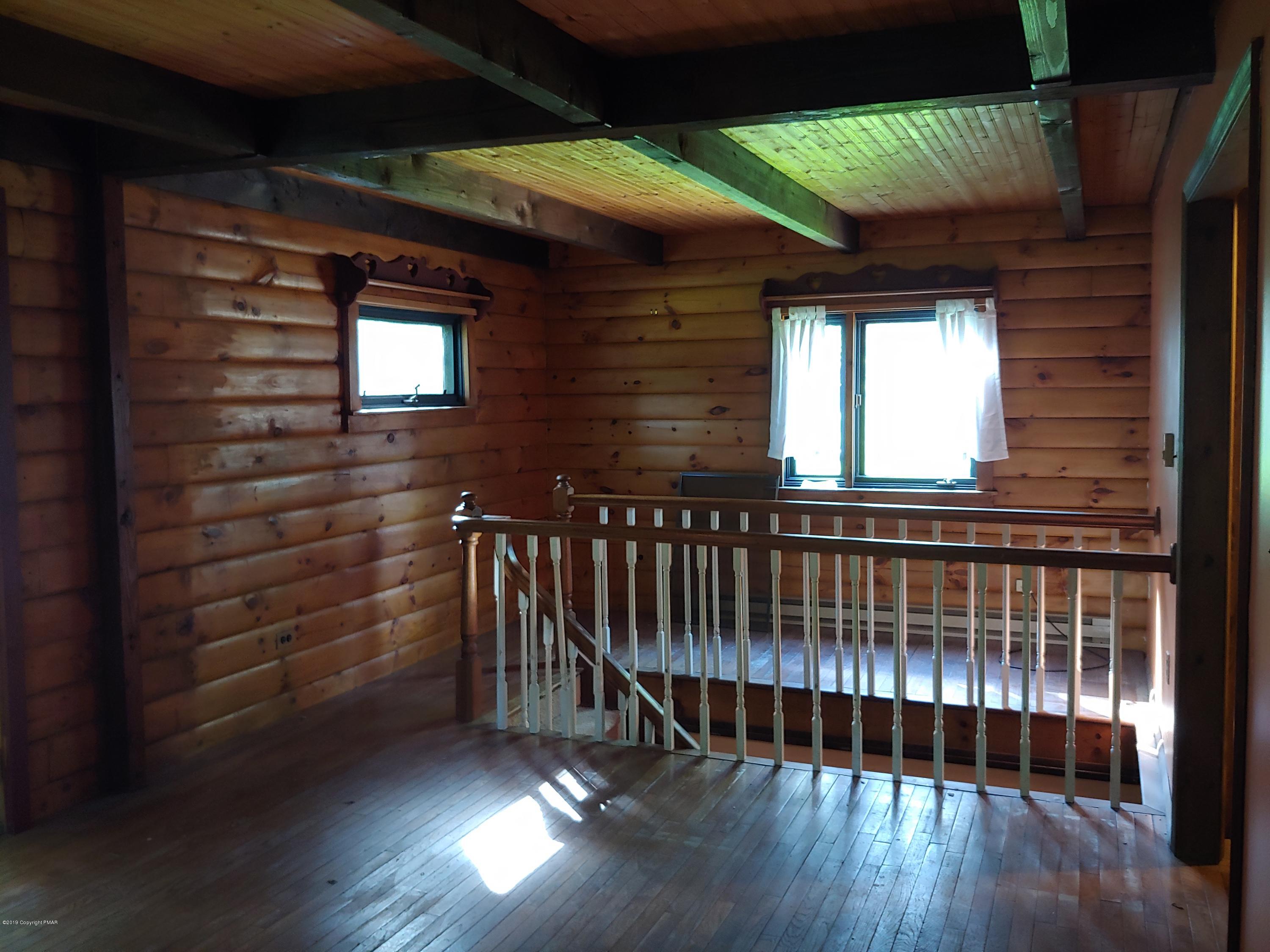140 Lake Road Canadensis, PA 18325 - Photo 14 of 33 a view of entryway with wooden floor
