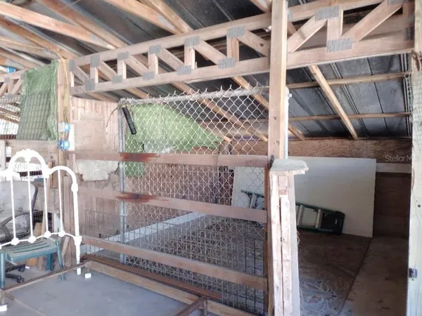 a view of a room with furniture and toys