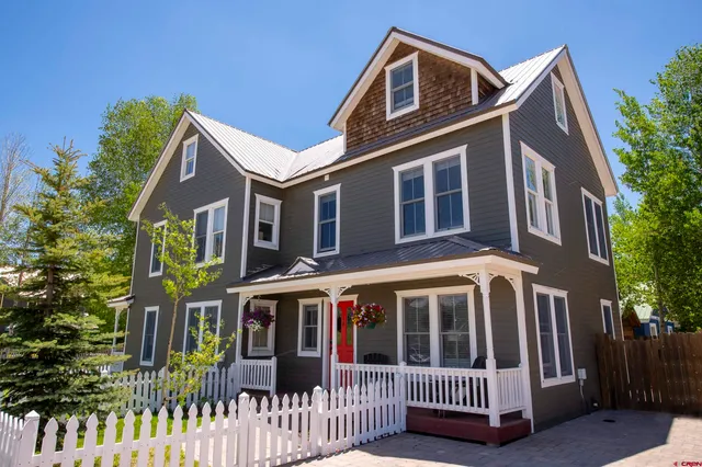 a front view of a house with a porch