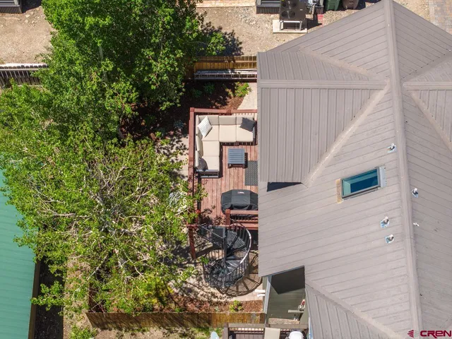 a view of balcony with wooden floor