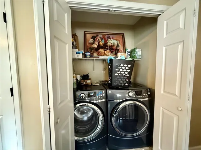 a view of washer and dryer in a utility room