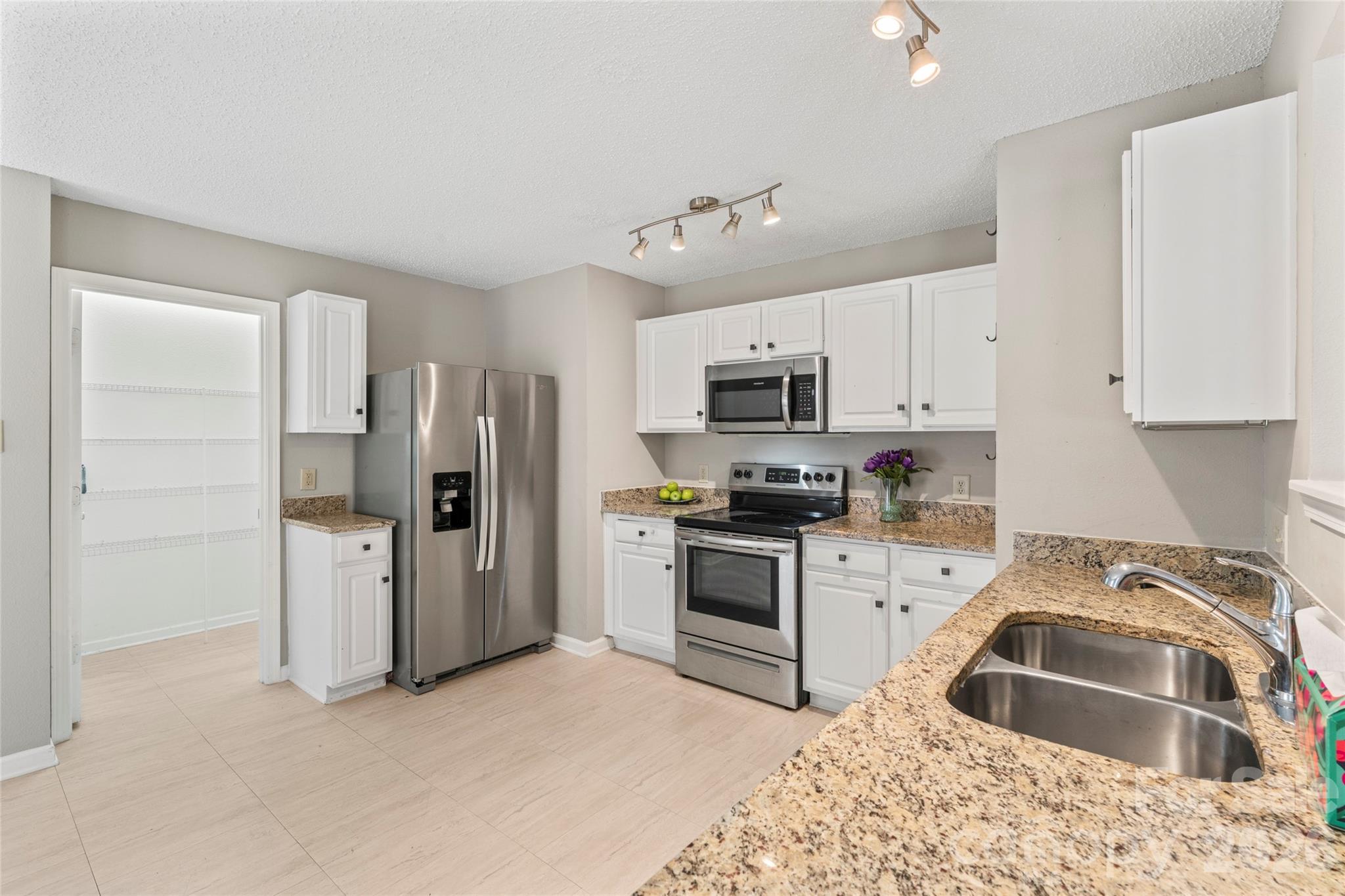 4208 Shasta Circle Clover, SC 29710 - Photo 20 of 41 a kitchen with a refrigerator stove and sink
