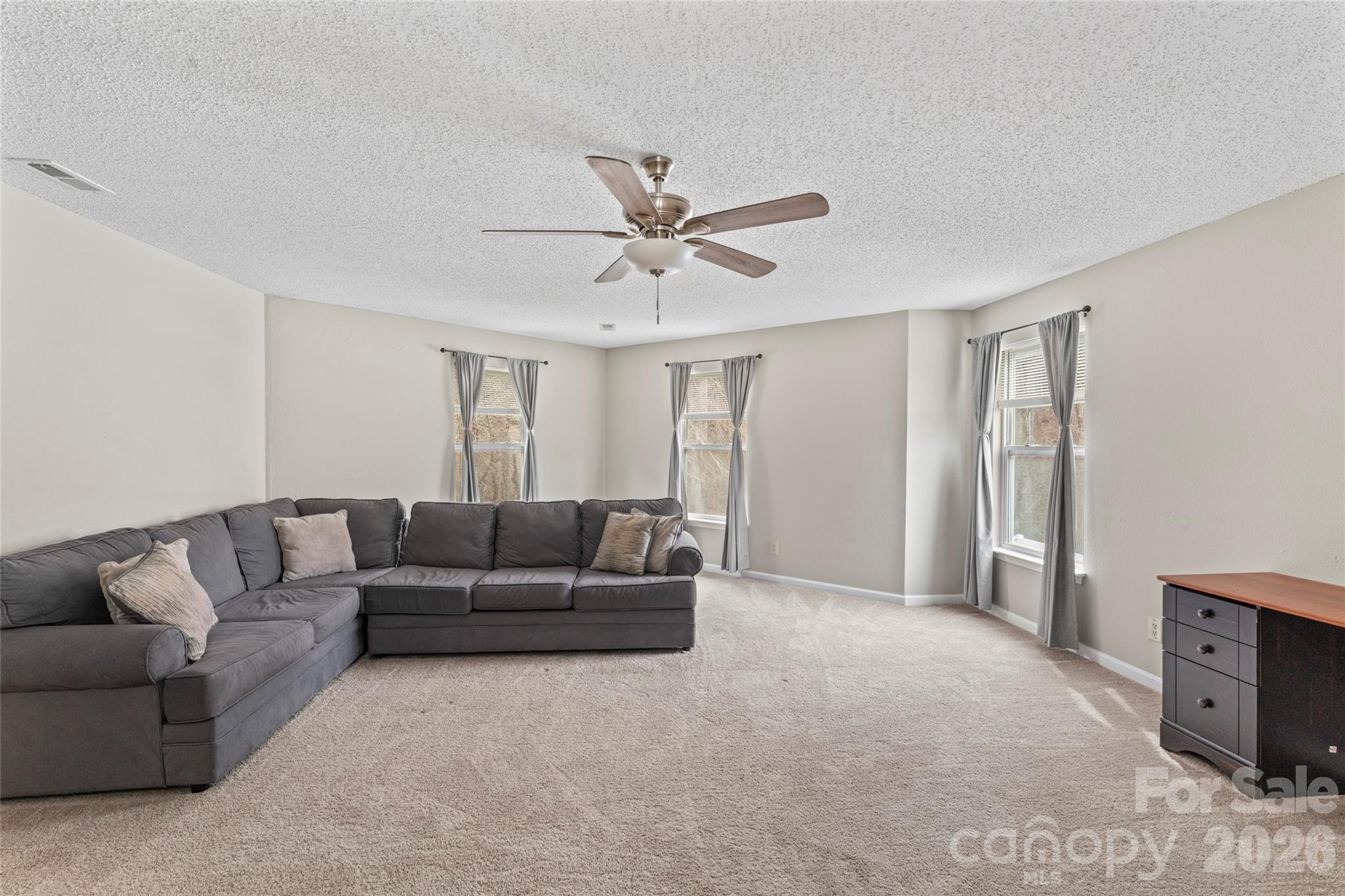 4208 Shasta Circle Clover, SC 29710 - Photo 26 of 41 a living room with furniture and a ceiling fan