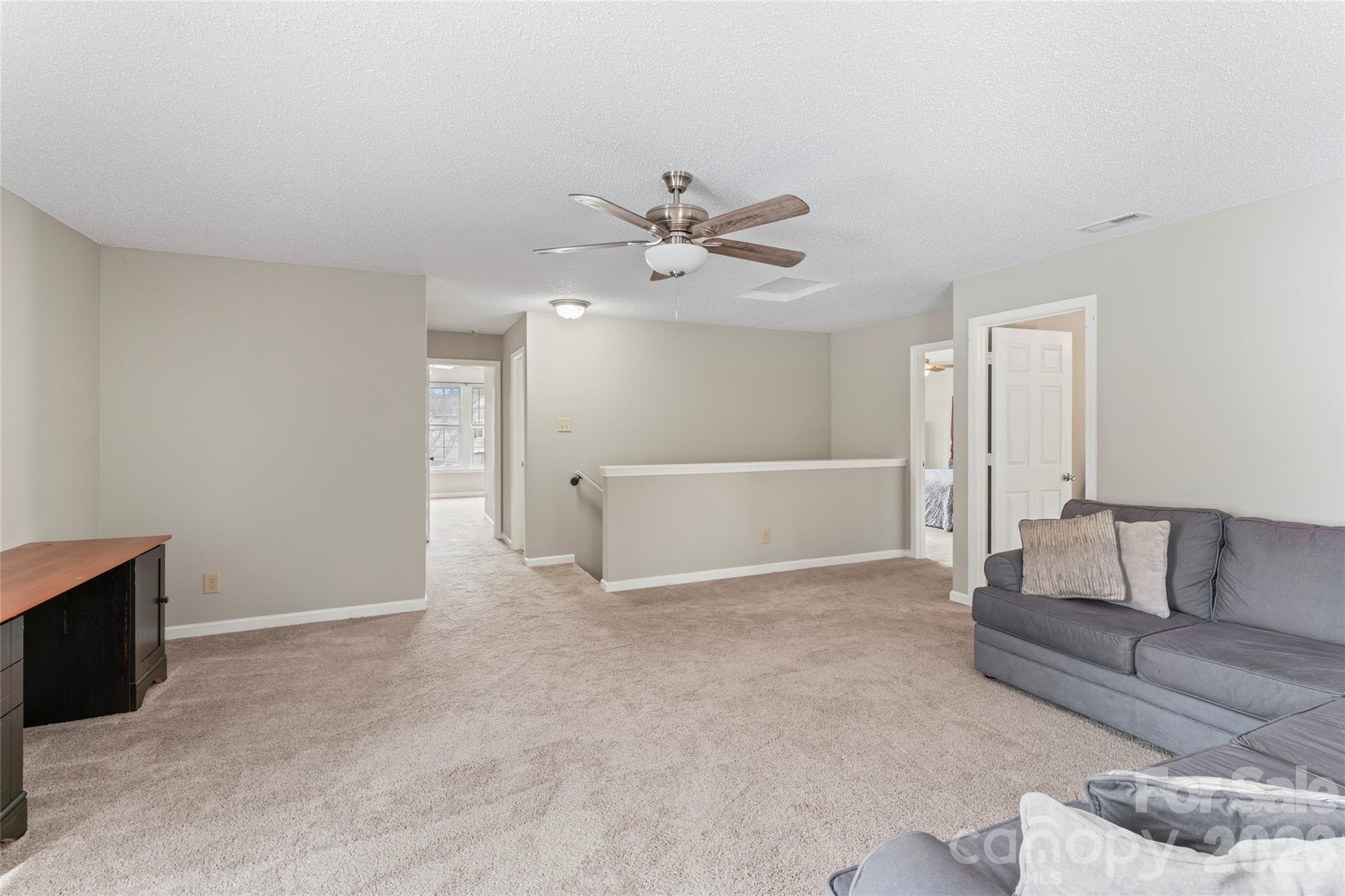4208 Shasta Circle Clover, SC 29710 - Photo 27 of 41 a view of a livingroom with furniture and a ceiling fan