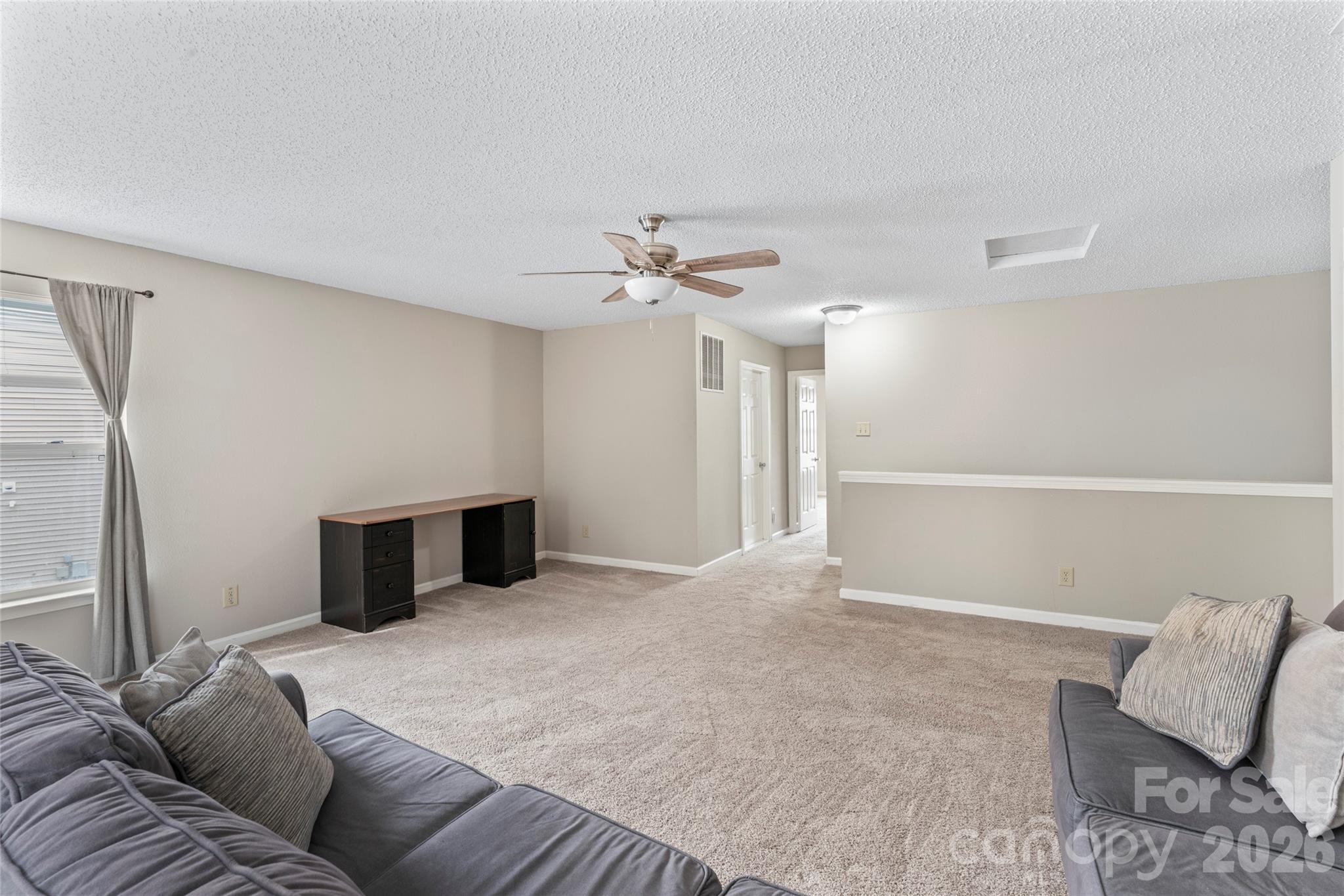 4208 Shasta Circle Clover, SC 29710 - Photo 28 of 41 a bedroom with furniture and a ceiling fan