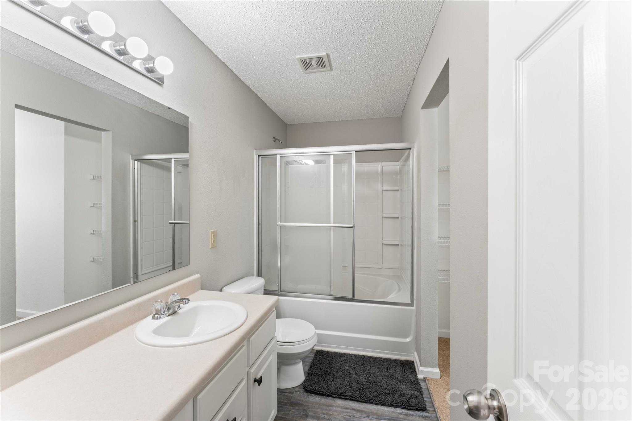 4208 Shasta Circle Clover, SC 29710 - Photo 35 of 41 a bathroom with a sink a toilet and shower