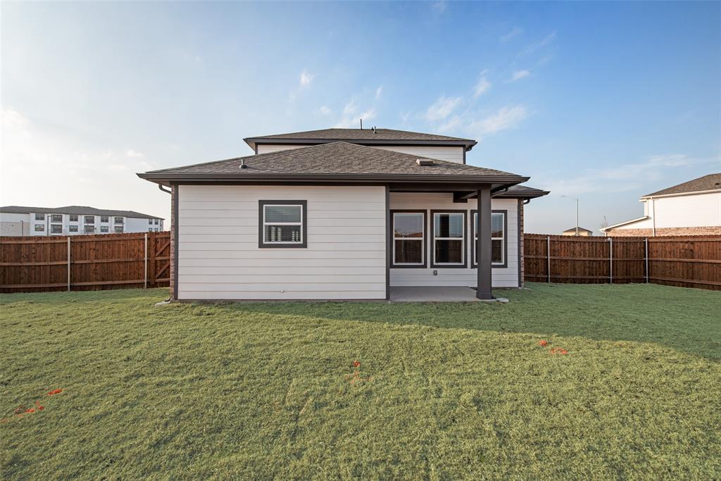 264 Sutter Mill Road Saginaw, TX 76131 - Photo 21 of 24 a house view with a garden space