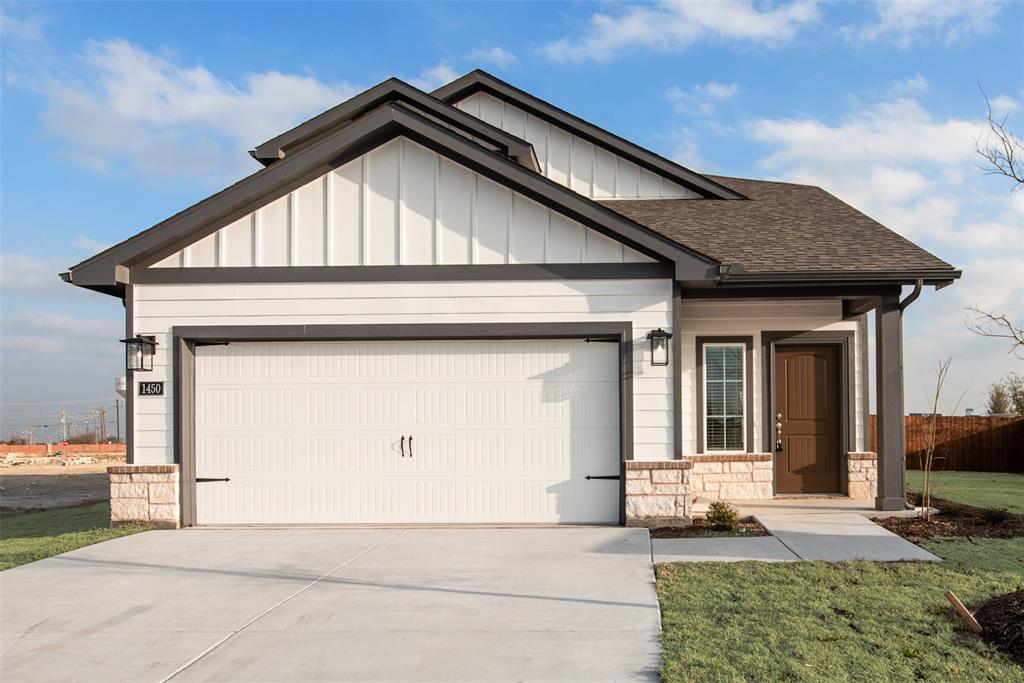 264 Sutter Mill Road Saginaw, TX 76131 - Photo 6 of 24 a front view of a house with garden
