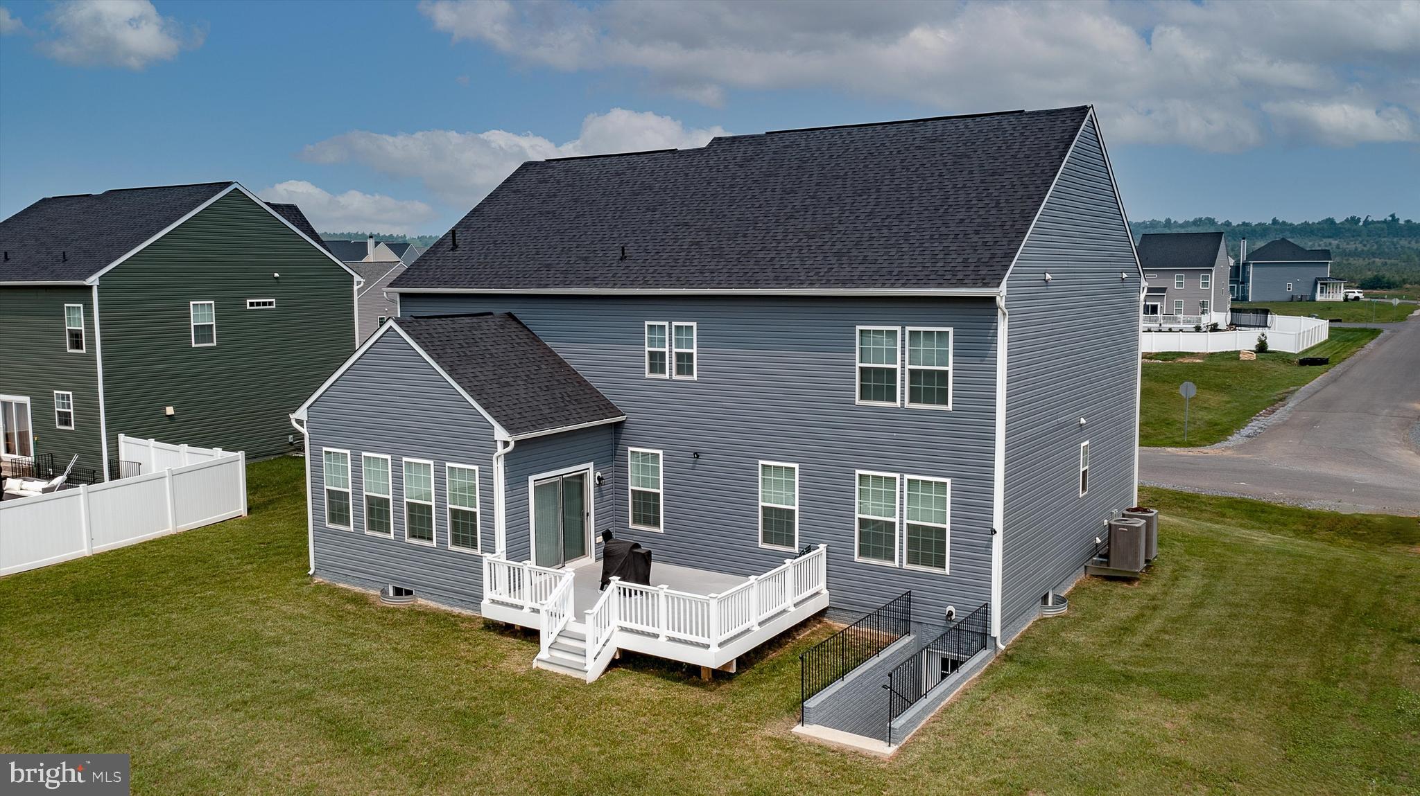 247 Lawrence Road Gerrardstown, WV 25420 - Photo 5 of 59 COMPOSITE DECK & WALK UP BASEMENT DOOR