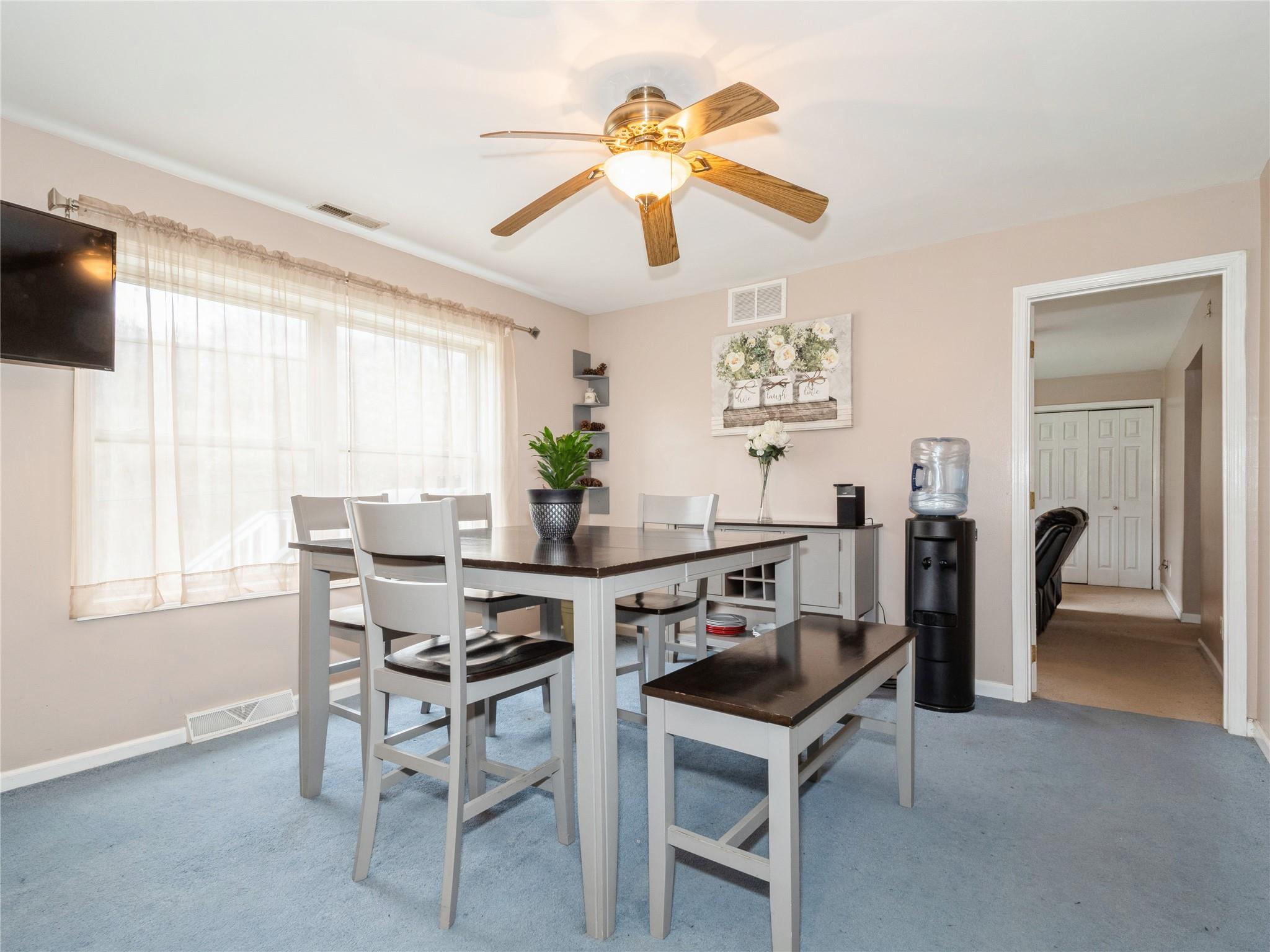 29 Dandelion Lane Wallkill, NY 12589 - Photo 21 of 50 a dining room with furniture and window