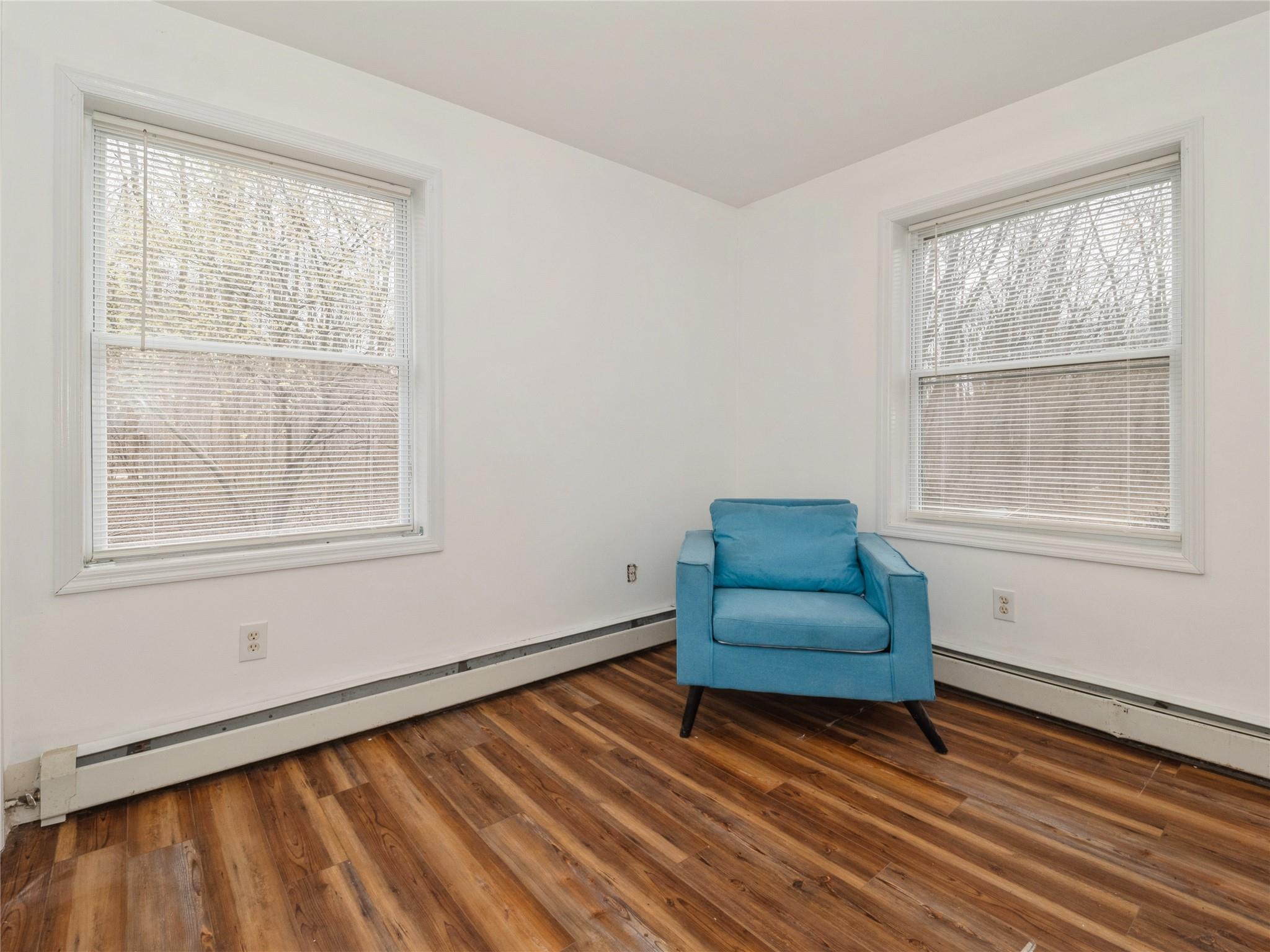 29 Dandelion Lane Wallkill, NY 12589 - Photo 36 of 50 a room with window and a wooden floor