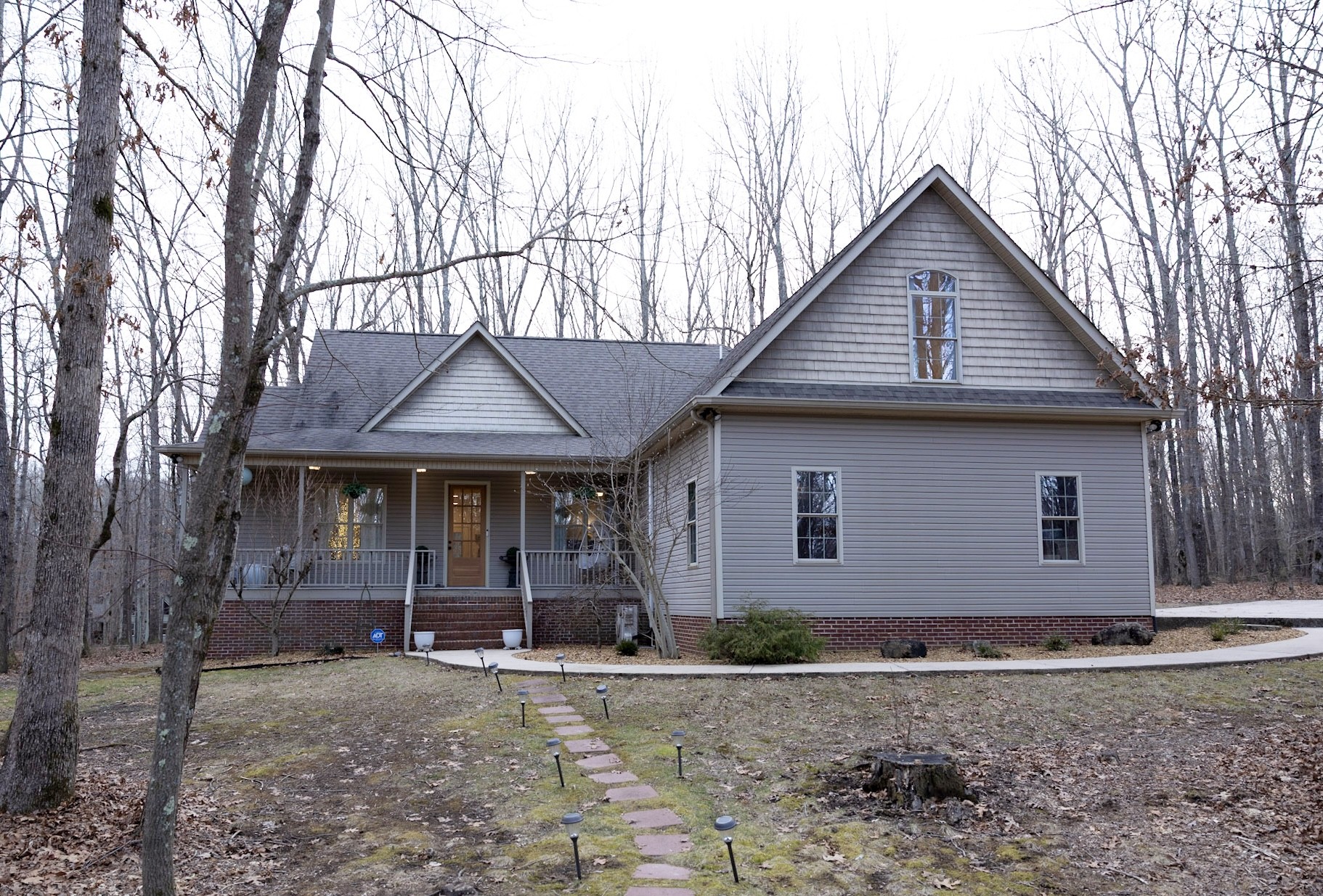 1629 Clifftops Avenue Monteagle, TN 37356 - Photo 35 of 45 a front view of a house with yard
