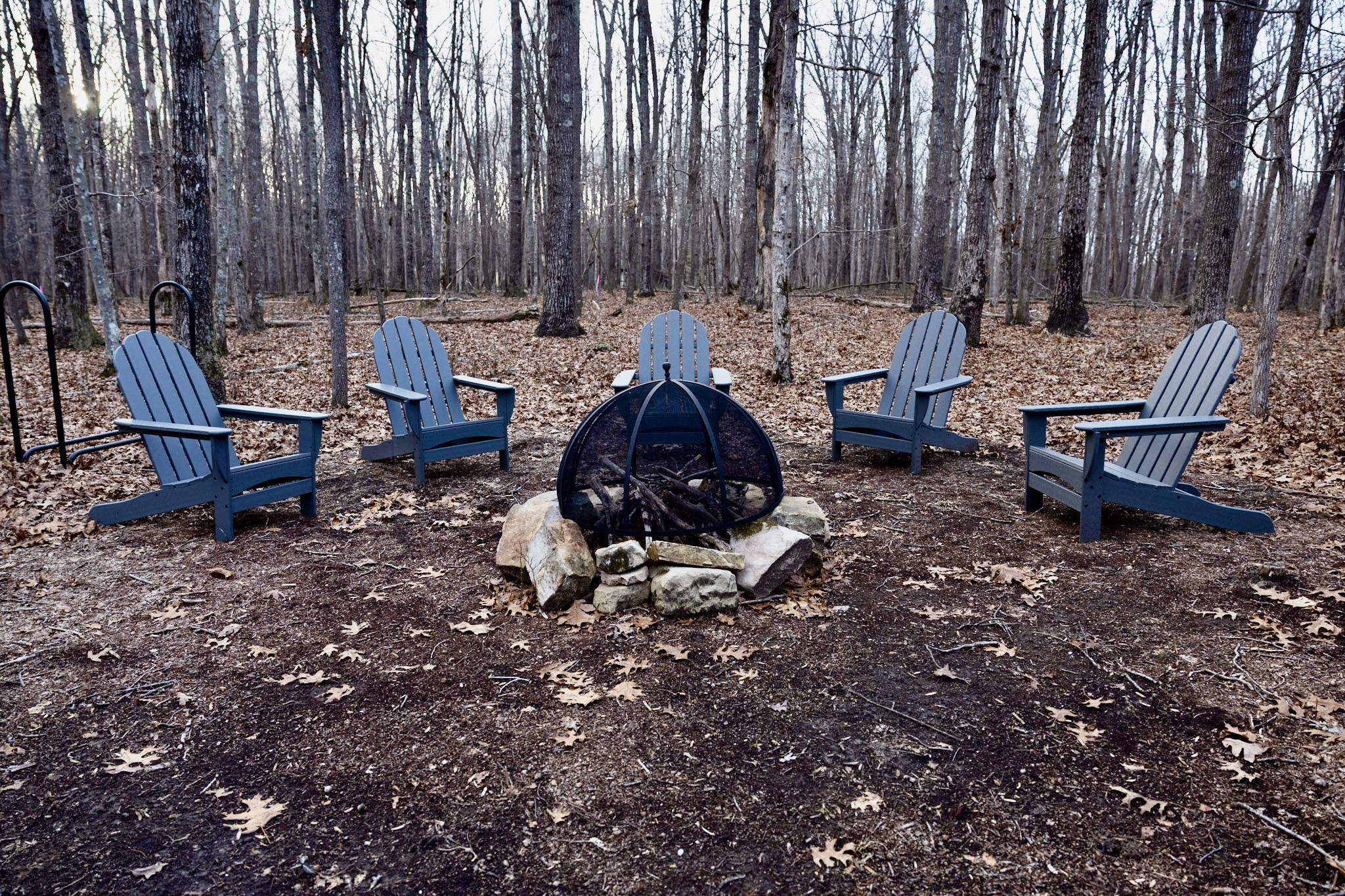 1629 Clifftops Avenue Monteagle, TN 37356 - Photo 38 of 45 a backyard of a house with barbeque oven table and chairs