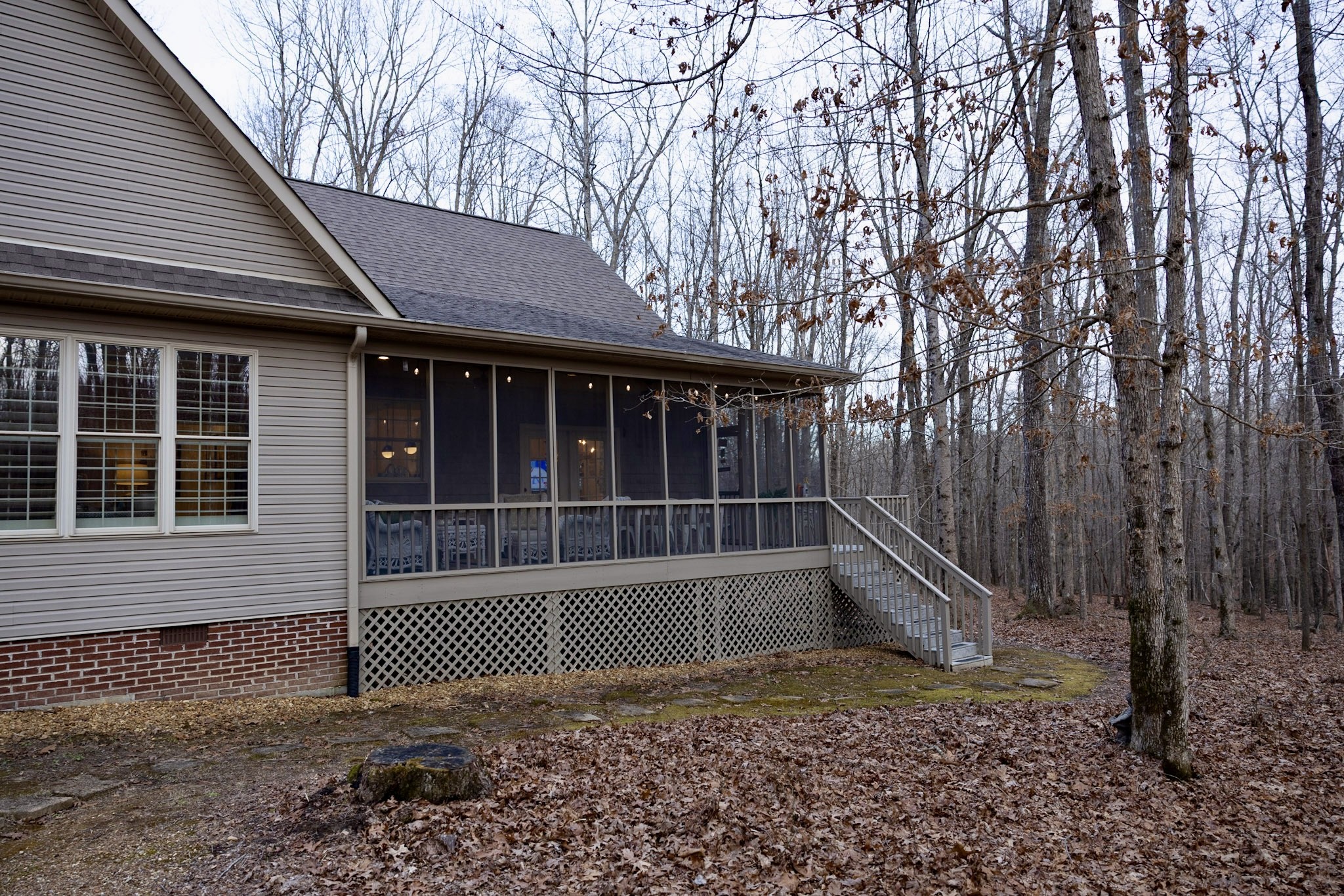 1629 Clifftops Avenue Monteagle, TN 37356 - Photo 40 of 45 a view of a house with a yard