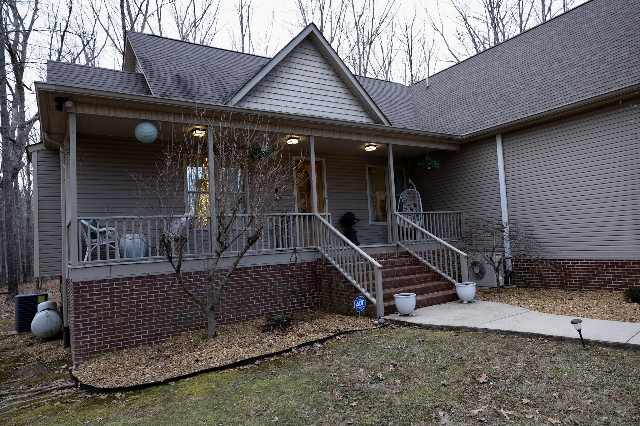 1629 Clifftops Avenue Monteagle, TN 37356 - Photo 43 of 45 a front view of a house with a yard