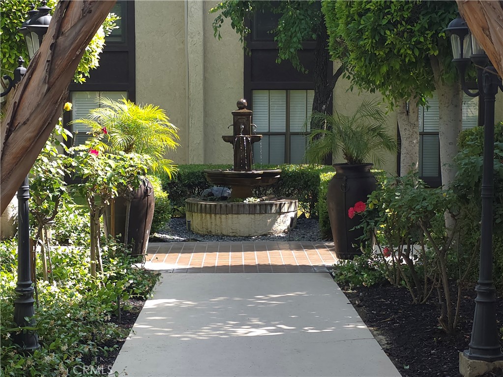 535 West Duarte Road, Unit 5 Arcadia, CA 91007 - Photo 12 of 17 a view of a pathway with flower plants