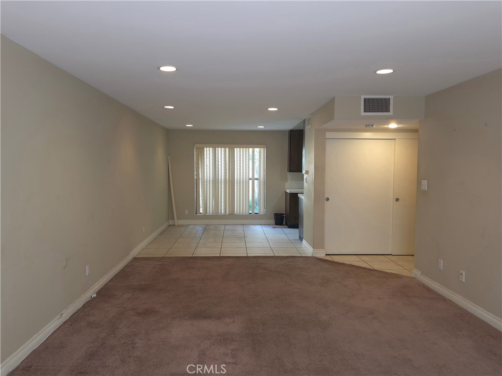 535 West Duarte Road, Unit 5 Arcadia, CA 91007 - Photo 3 of 17 an empty room with a empty space and window