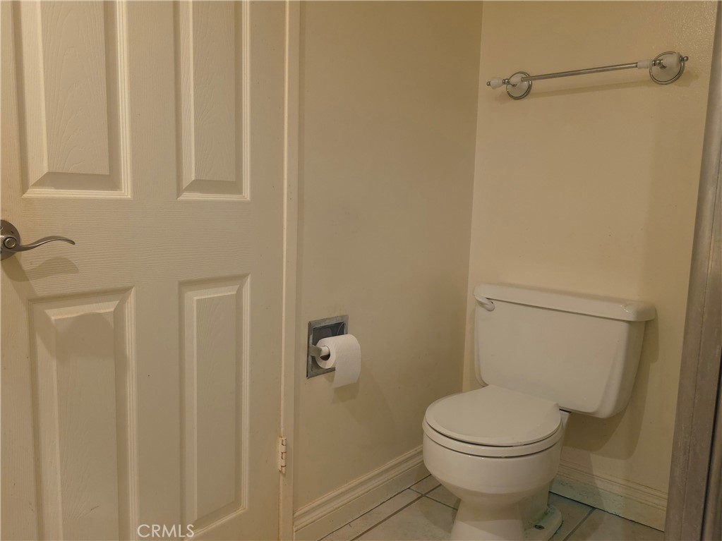 535 West Duarte Road, Unit 5 Arcadia, CA 91007 - Photo 8 of 17 a white toilet sitting next to a shower