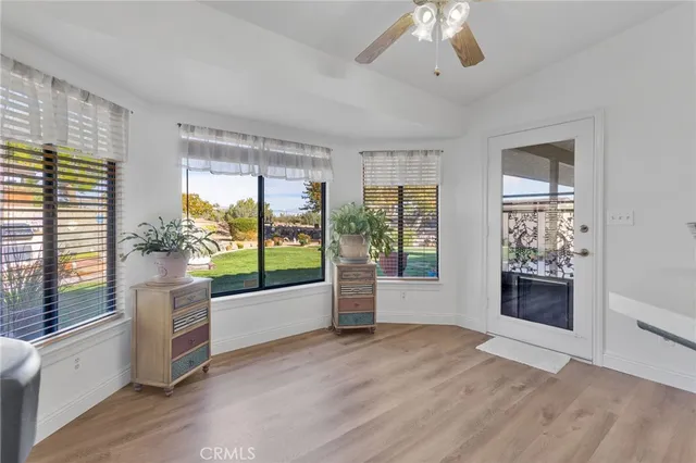 a kitchen with stainless steel appliances a sink cabinets and a refrigerator
