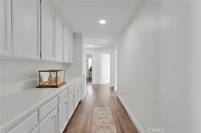 a bathroom with a sink a large mirror and a shower
