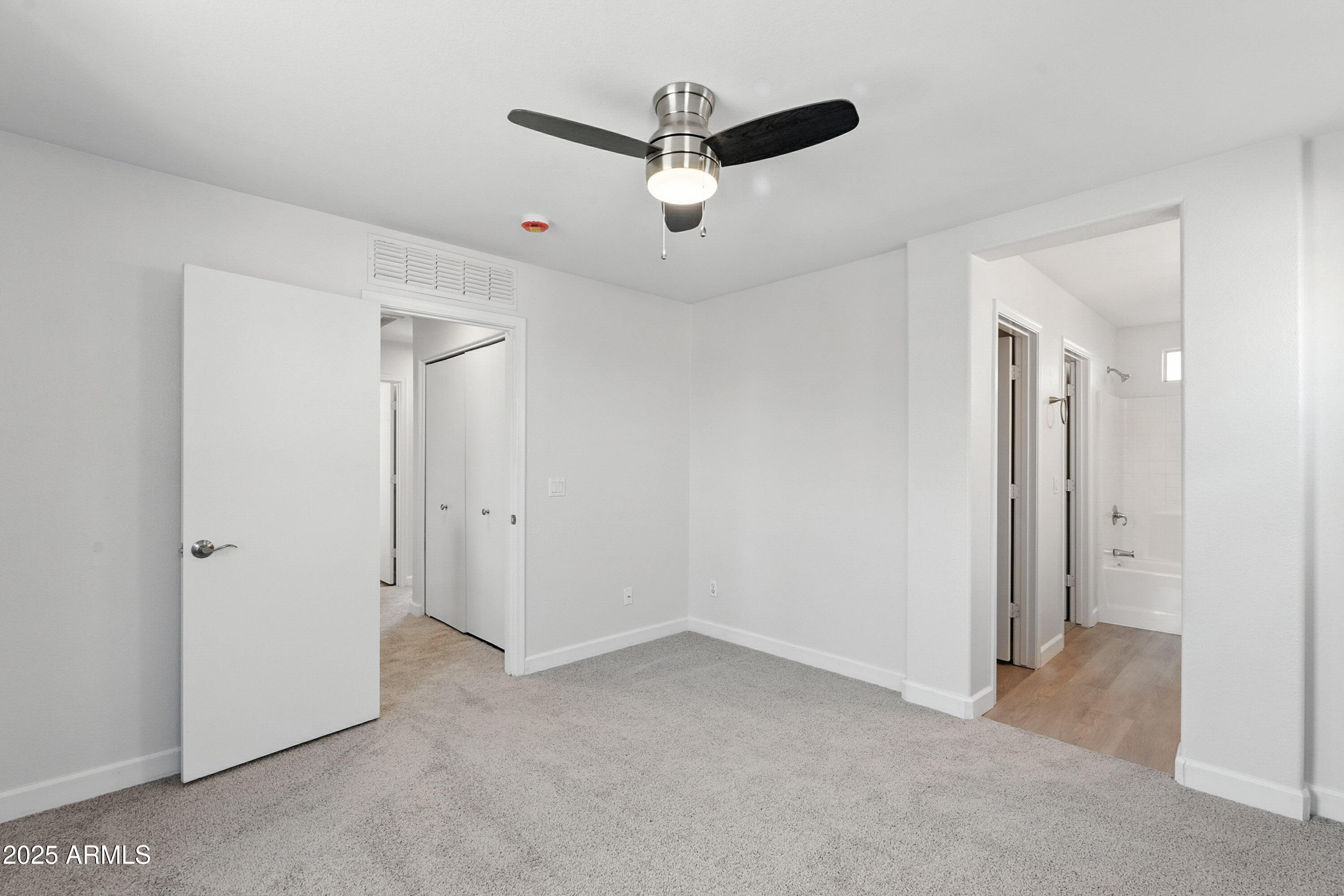 1409 East Bloch Road Phoenix, AZ 85040 - Photo 14 of 24 a view of a room with a ceiling fan