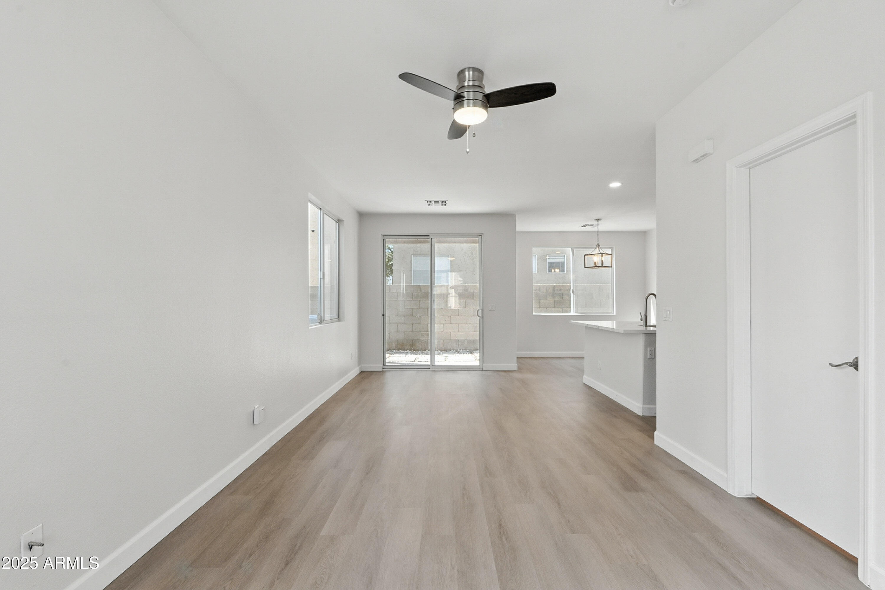 1409 East Bloch Road Phoenix, AZ 85040 - Photo 5 of 24 a view of an empty room with a window