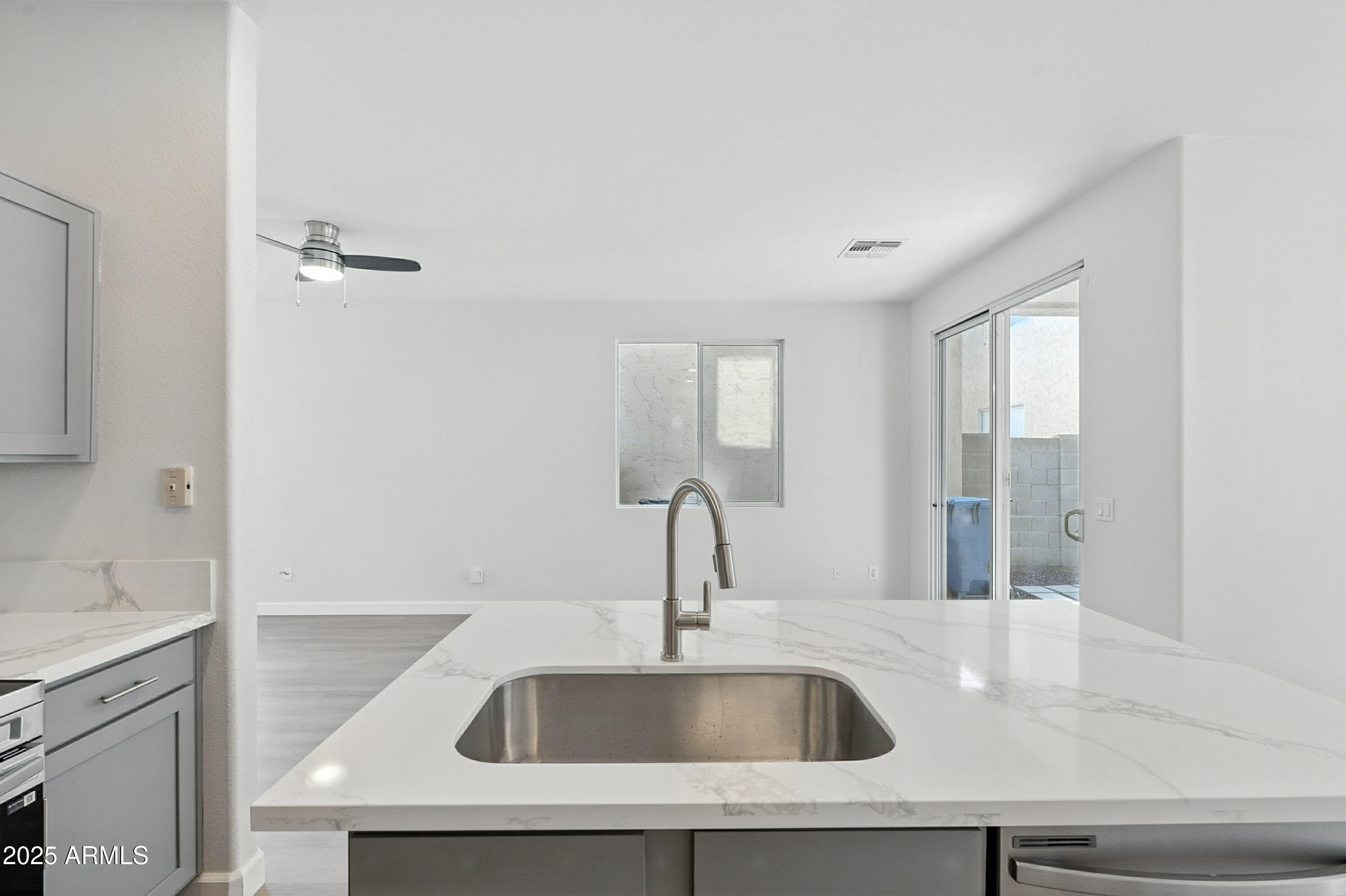 1409 East Bloch Road Phoenix, AZ 85040 - Photo 9 of 24 a close view of a sink and dishwasher in a bathroom