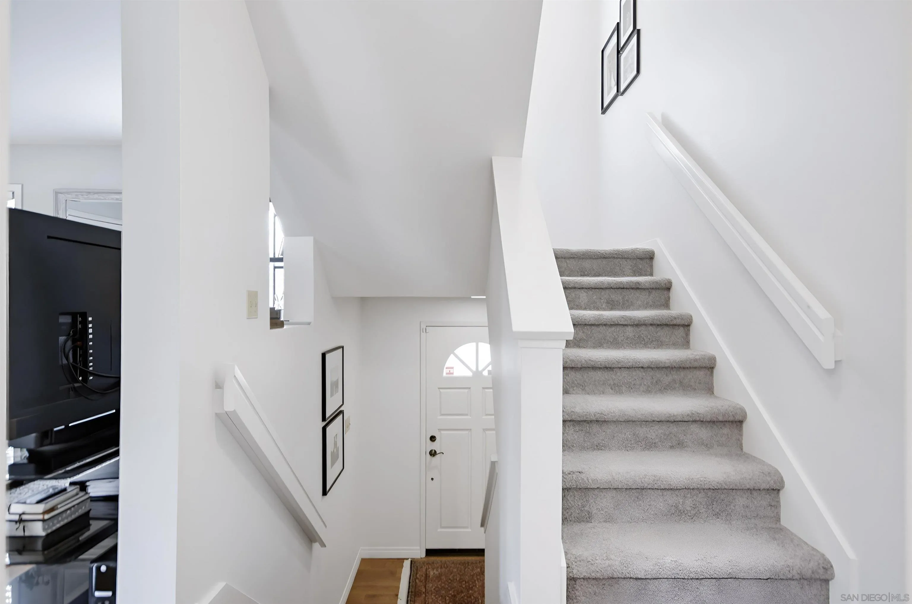 5822 Mission Center Road, Unit A San Diego, CA 92108 - Photo 18 of 35 a view of entryway and hall with wooden floor