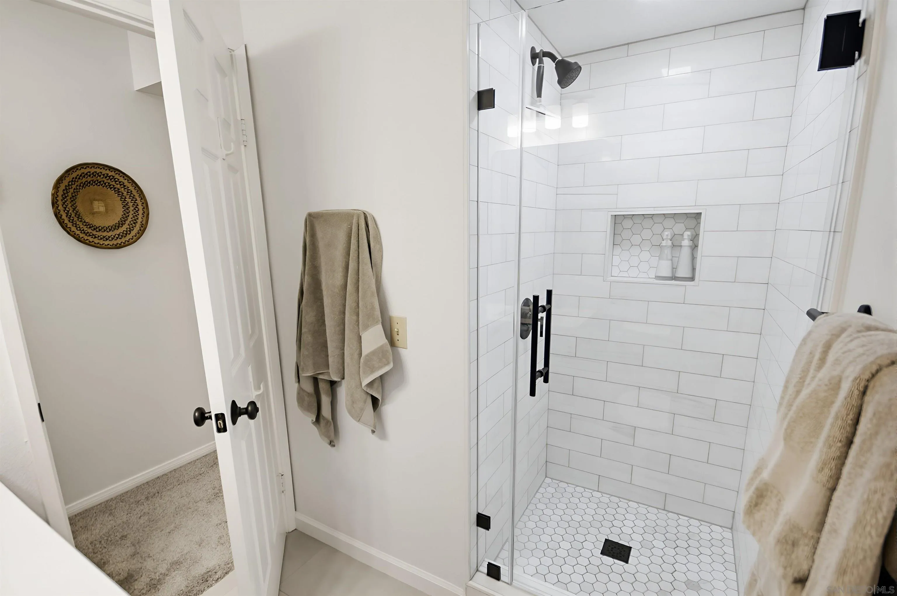 5822 Mission Center Road, Unit A San Diego, CA 92108 - Photo 20 of 35 a bathroom with a shower