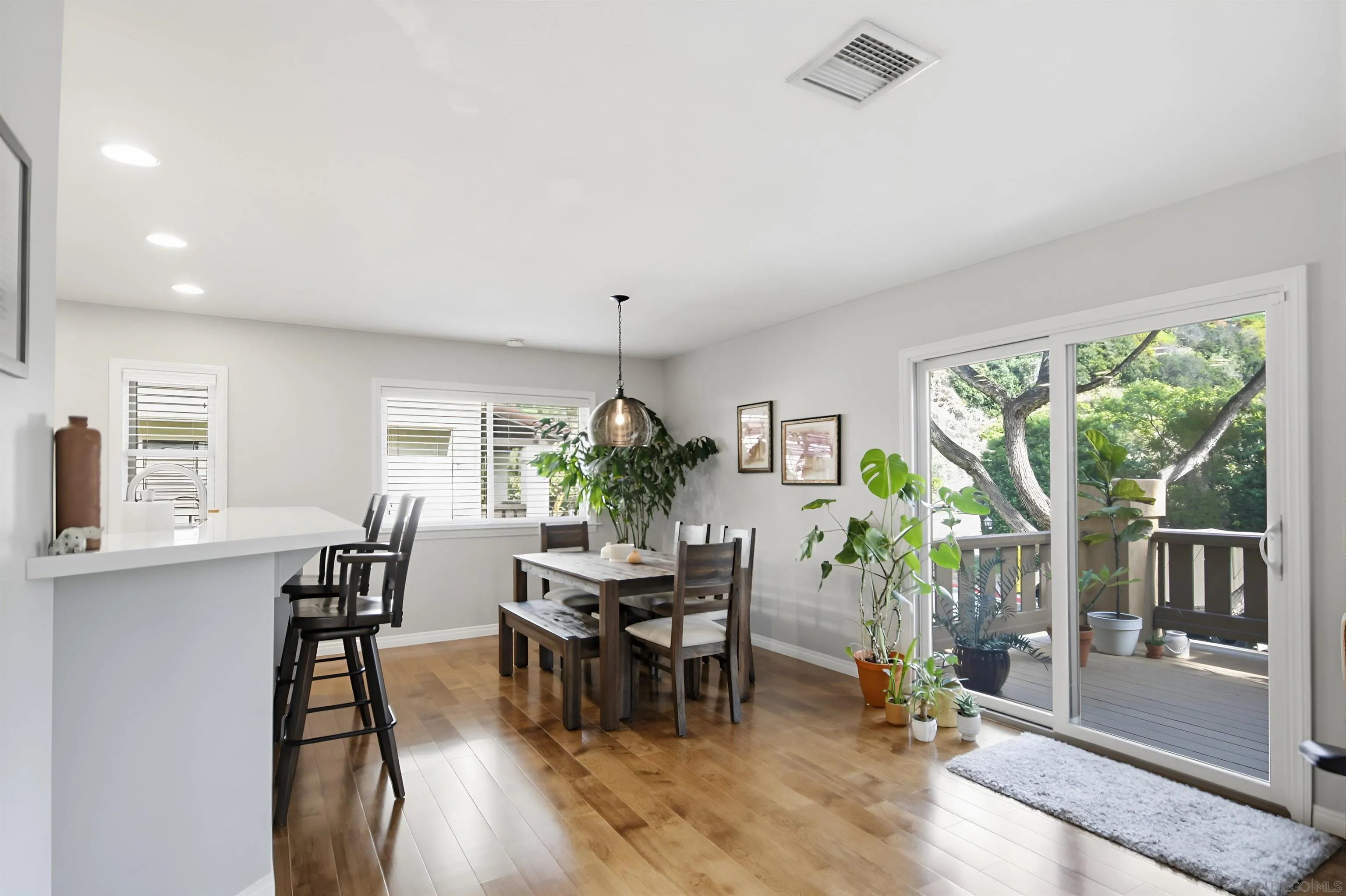 5822 Mission Center Road, Unit A San Diego, CA 92108 - Photo 7 of 35 a view of a dining room with furniture window and outside view