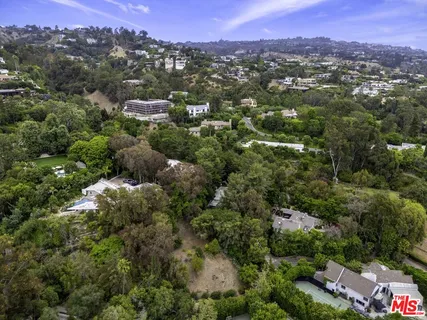 an aerial view of a city with lots of residential buildings