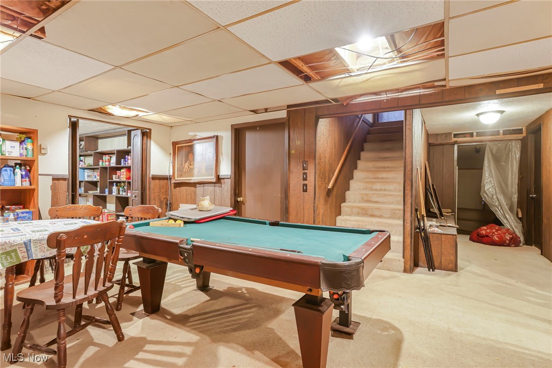 232 McGill Road Vincent, OH 45784 - Photo 35 of 49 Recreation room with a drop ceiling, wooden walls, pool table, wainscoting, and carpet