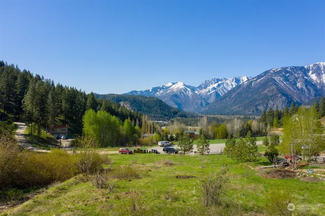 a view of a town with barn house