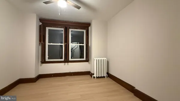 a bathroom with a sink a mirror and a shower