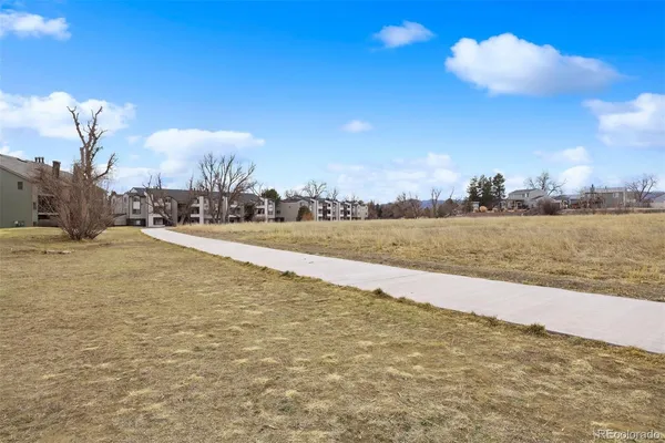 a brick building with a sign on the side of it