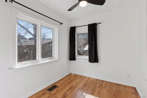 an empty room with windows
