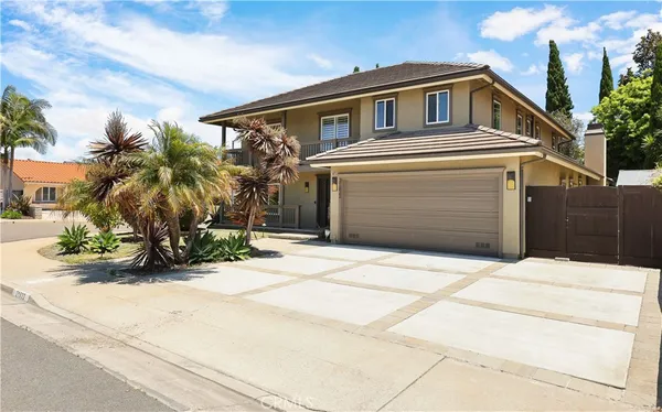 a front view of a house with a garage