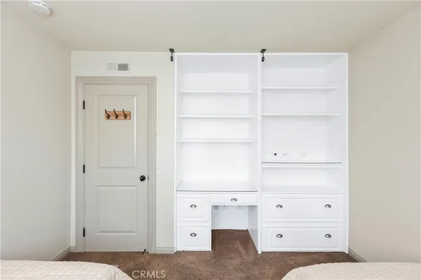 a living room with closet