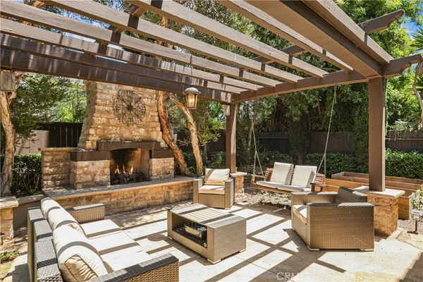 a outdoor living space with patio furniture and garden view